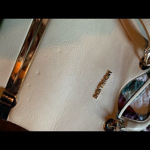 Not a Real M. Kors bag, very nice thou.. with a neat bottom compartment